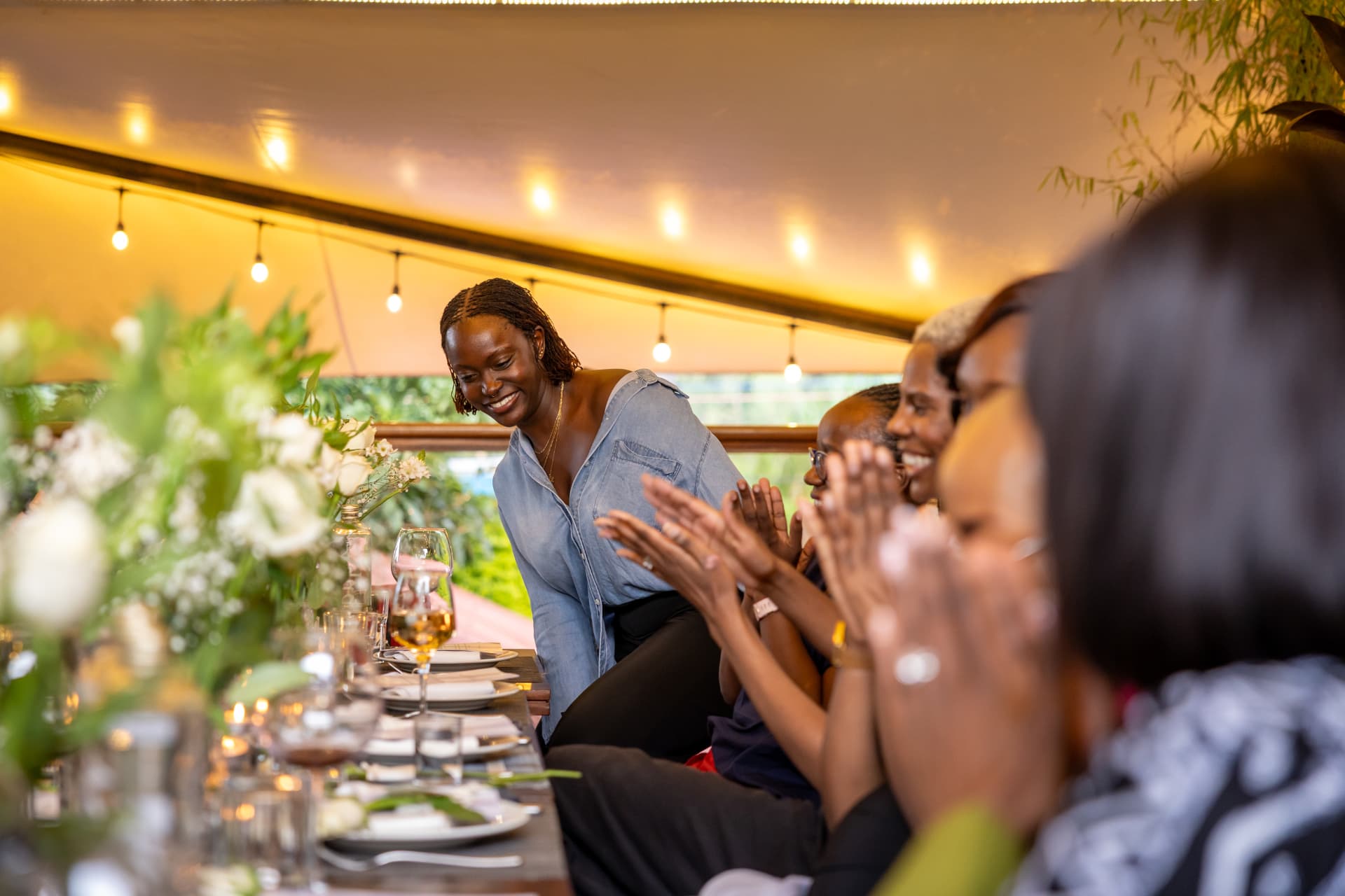 Guests applauding during a toast